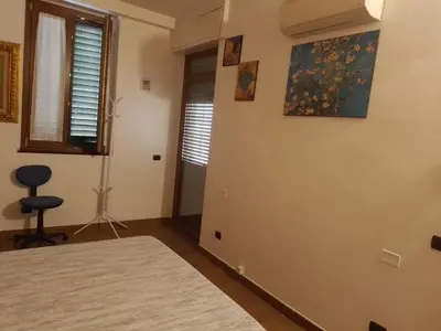 Letto o letti in una camera di Casa Angi