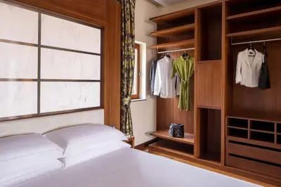 Letto o letti in una camera di Repubblica Firenze Luxury Apartments | UNA Esperienze