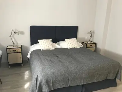 Letto o letti in una camera di Dimora 16 Rooms & Garden
