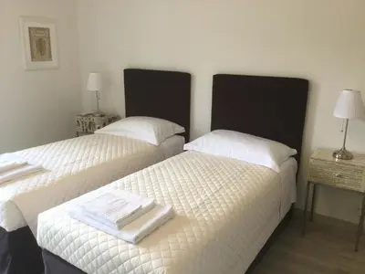 Letto o letti in una camera di Dimora 16 Rooms & Garden