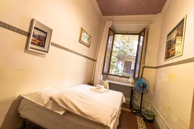 Letto o letti in una camera di Soggiorno Primavera