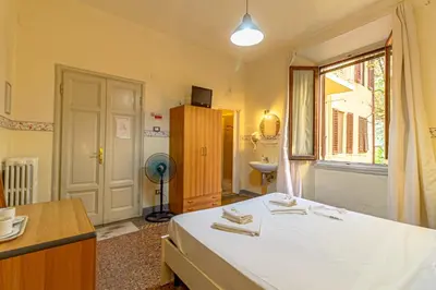 Letto o letti in una camera di Soggiorno Primavera