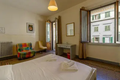 Letto o letti in una camera di Soggiorno Primavera