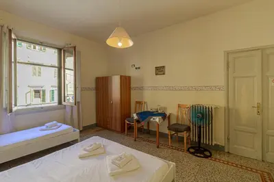 Letto o letti in una camera di Soggiorno Primavera