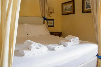 Letto o letti in una camera di Antica Dimora Johlea