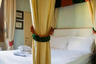 Letto o letti in una camera di Antica Dimora Johlea