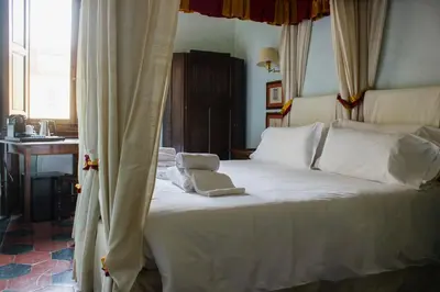 Letto o letti in una camera di Antica Dimora Johlea