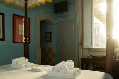 Letto o letti in una camera di Antica Dimora Firenze