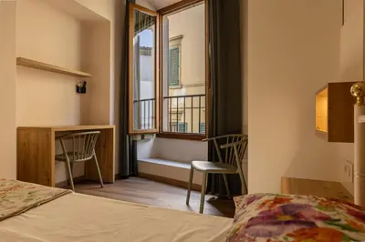 Letto o letti in una camera di Hostel Archi Rossi