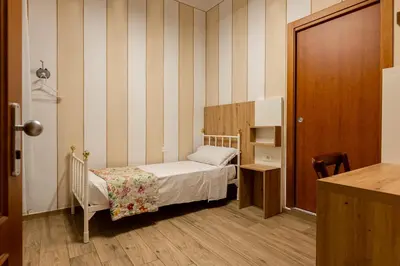 Letto o letti in una camera di Hostel Archi Rossi