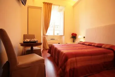 Letto o letti in una camera di B&B Magnifico Messere