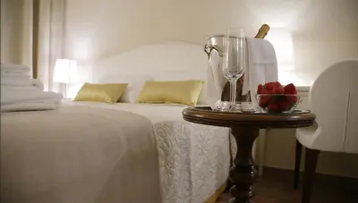 Letto o letti in una camera di Hotel Renaissance