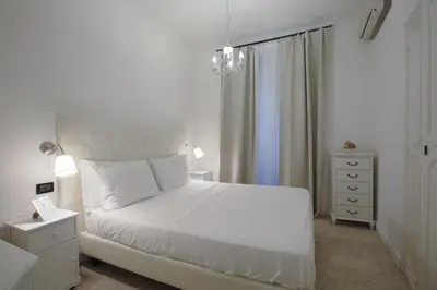 Letto o letti in una camera di Badia Fiorentina