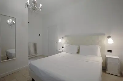 Letto o letti in una camera di Badia Fiorentina