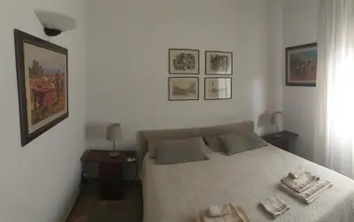Letto o letti in una camera di B&B Jacopino