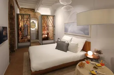 Letto o letti in una camera di Casa Thiele alla Signoria