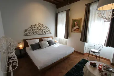Letto o letti in una camera di Casa Thiele alla Signoria