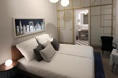Letto o letti in una camera di Casa Thiele alla Signoria