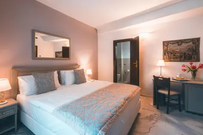 Letto o letti in una camera di Hotel Palazzo Benci