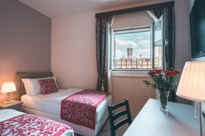 Letto o letti in una camera di Hotel Palazzo Benci