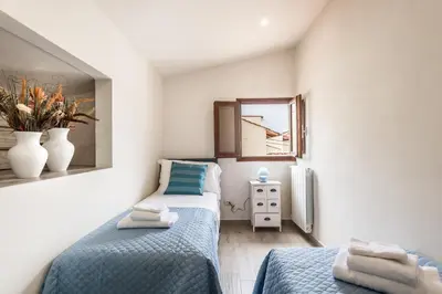 Letto o letti in una camera di Dreamy Guelfa by Mmega