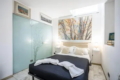 Letto o letti in una camera di 11 Duomo - Monolocale caratteristico