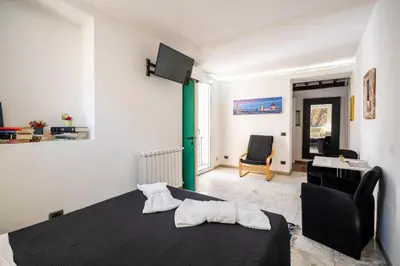 Letto o letti in una camera di 11 Duomo - Monolocale caratteristico