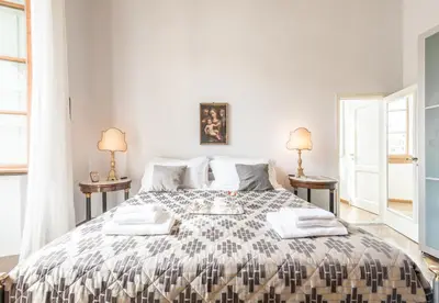 Letto o letti in una camera di Luxury Petra San Frediano by Mmega