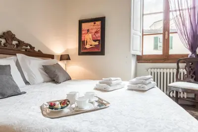 Letto o letti in una camera di Luxury Petra San Frediano by Mmega