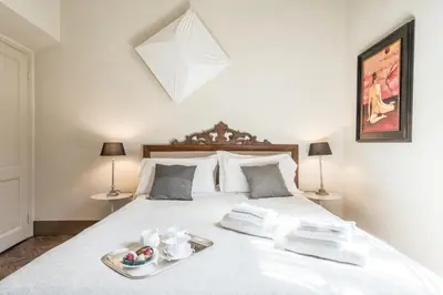 Letto o letti in una camera di Luxury Petra San Frediano by Mmega