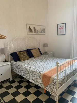 Letto o letti in una camera di Cadorna