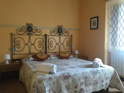 Letto o letti in una camera di Hotel Aline