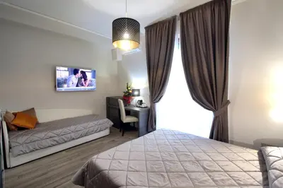 Letto o letti in una camera di Alderotti Home