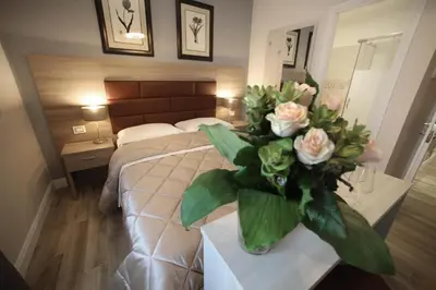 Letto o letti in una camera di Alderotti Home