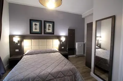 Letto o letti in una camera di Alderotti Home