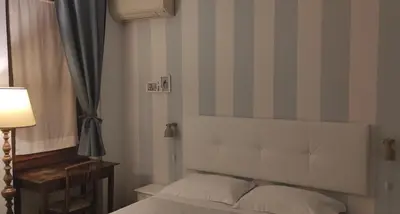 Letto o letti in una camera di A Teatro