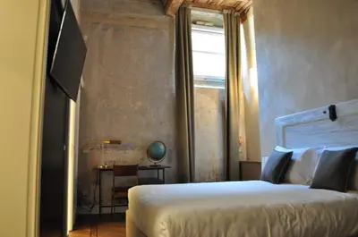 Letto o letti in una camera di Residenza La Musa Amarcord
