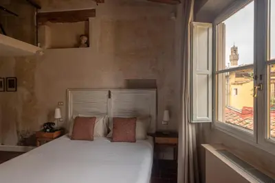 Letto o letti in una camera di Residenza La Musa Amarcord