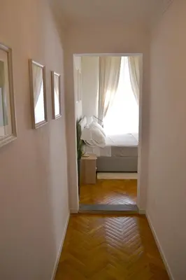 Letto o letti in una camera di Domus Duomo