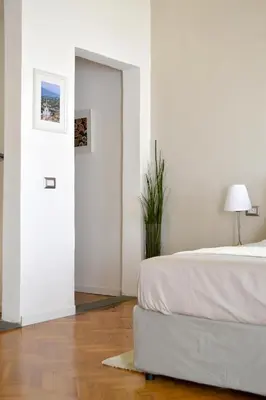 Letto o letti in una camera di Domus Duomo
