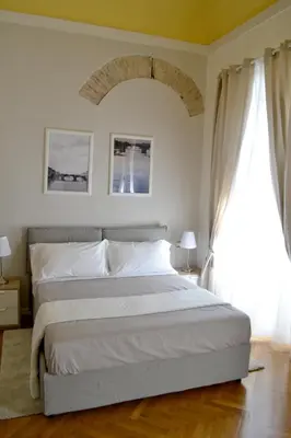 Letto o letti in una camera di Domus Duomo