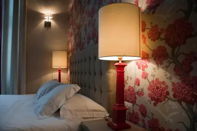 Letto o letti in una camera di Nove Guest House