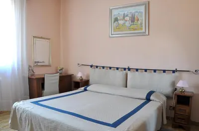 Letto o letti in una camera di Residenza Cantagalli
