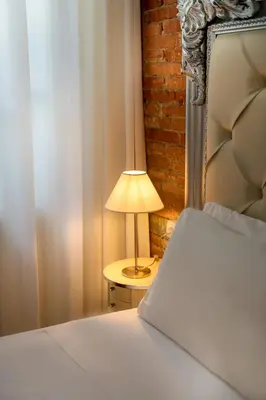 Letto o letti in una camera di Residenza Conte di Cavour & Rooftop - dBe Hotels