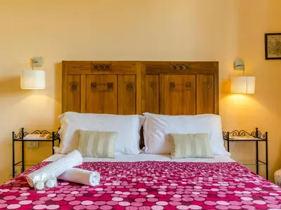 Letto o letti in una camera di Sangaggio House B&B