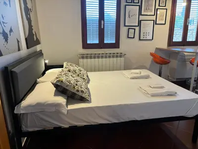 Letto o letti in una camera di The San Frediano Cool-Spot Florence Center