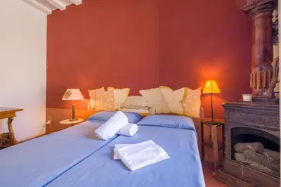 Letto o letti in una camera di Typical Florentine Apartment