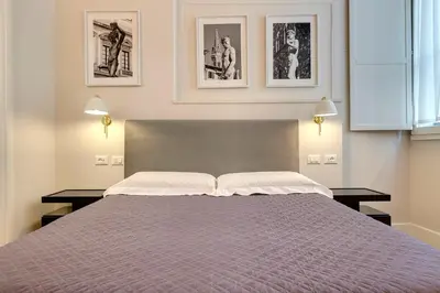 Letto o letti in una camera di TAILOR HOUSE B&B