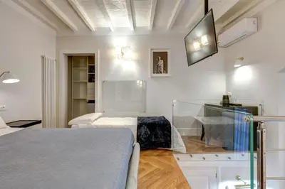 Letto o letti in una camera di TAILOR HOUSE B&B