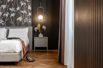 Letto o letti in una camera di Aramis Deluxe Rooms
